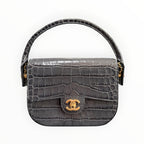 Chanel 2026 Metiers d'Art Croc Embossed Turn Around Mini Flap NIB